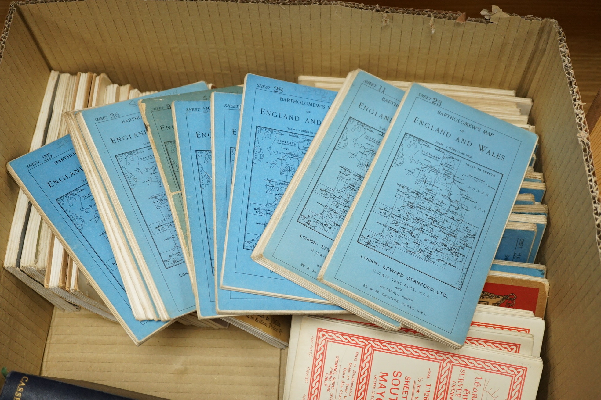Twenty-five Bartholomew's series maps of England and Wales, together with five Bartholomew roadmaps of Ireland, four ordnance survey maps of Ireland, fourteen ordnance survey tourist maps, and RAC Route Book for England